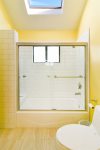 Features a tub/shower combiniation